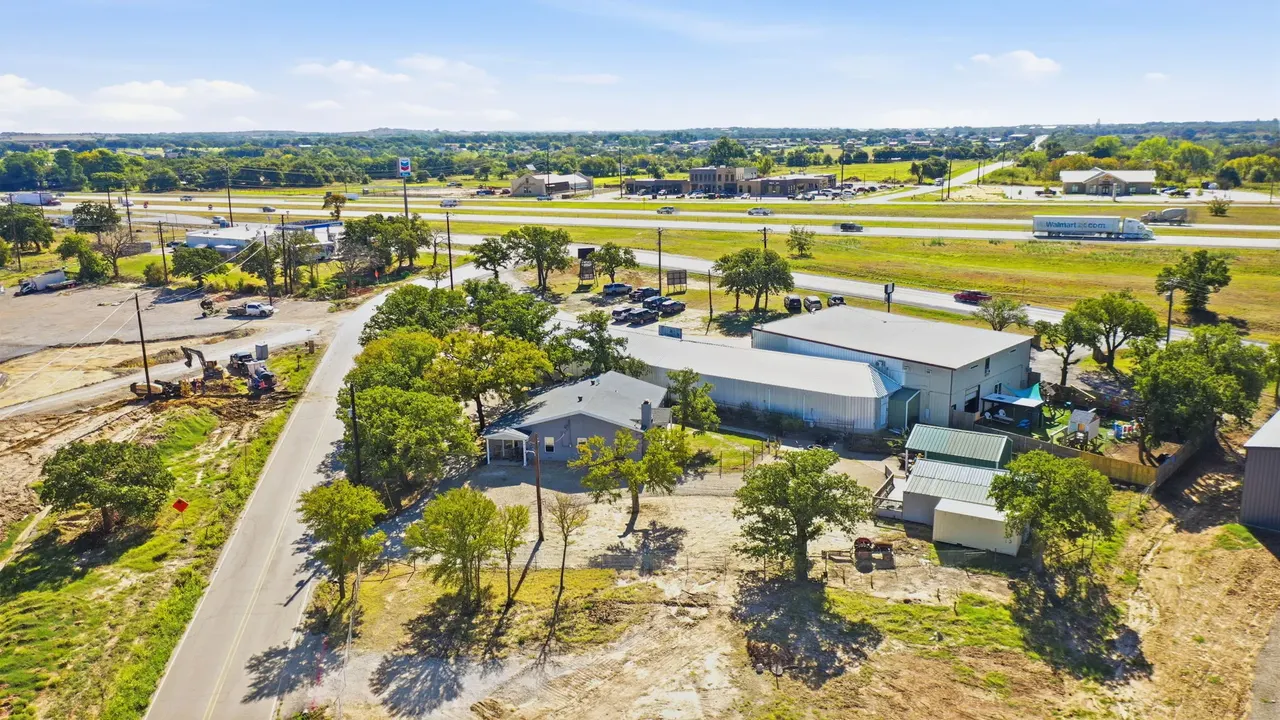 Aerial view of the lot with the interstate running behind it