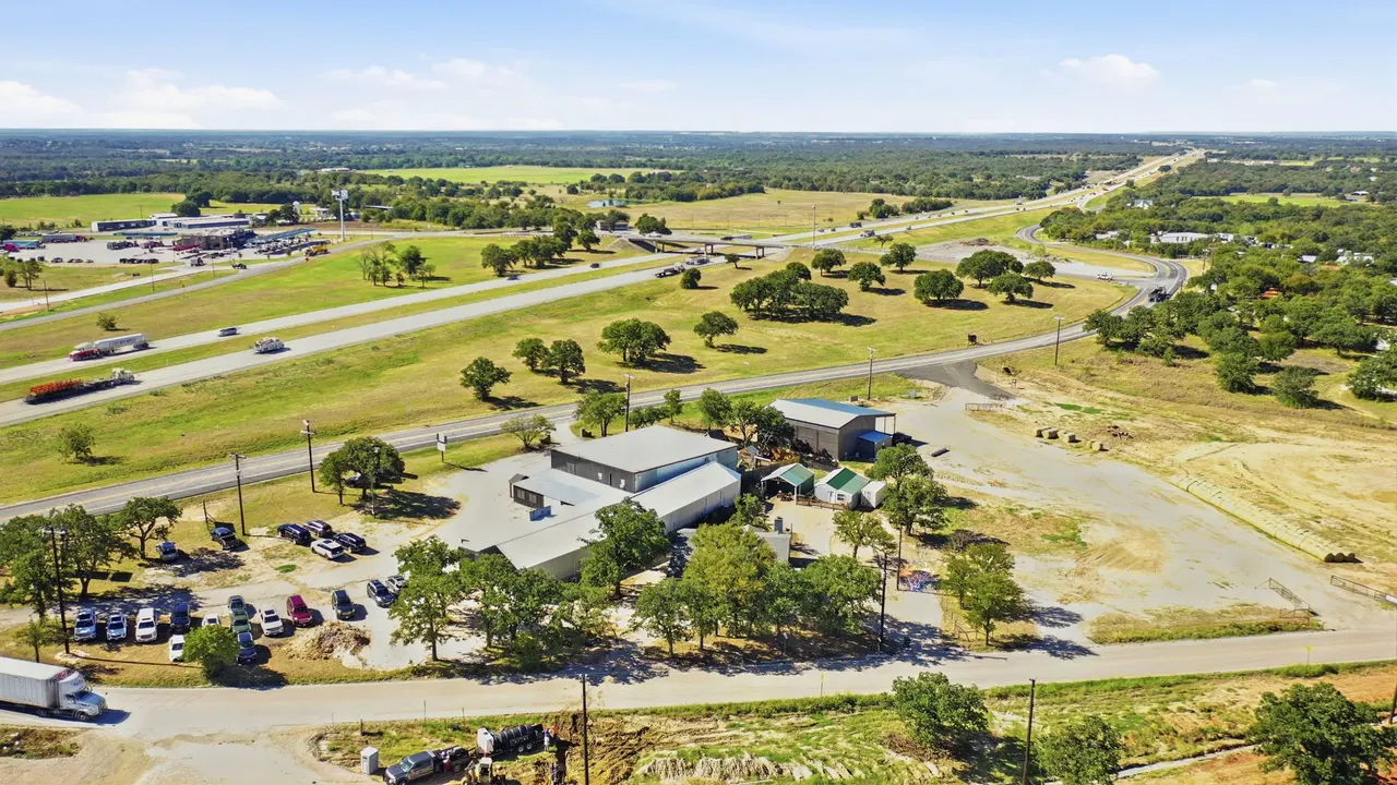 Aerial view along the interstate corridor past the property