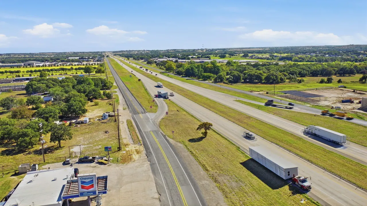 Aerial view of the interstate and the access road beside it