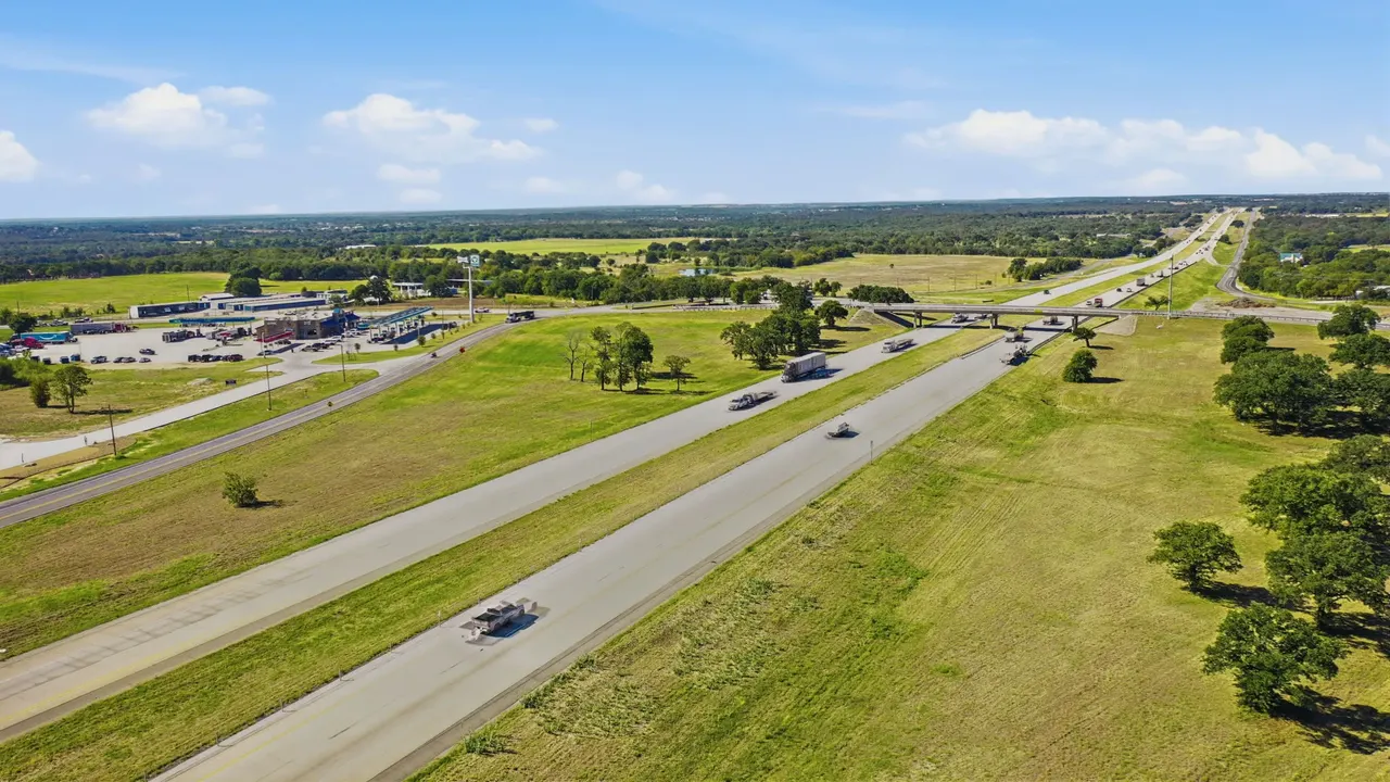 Aerial view of the interstate leading to an overpass